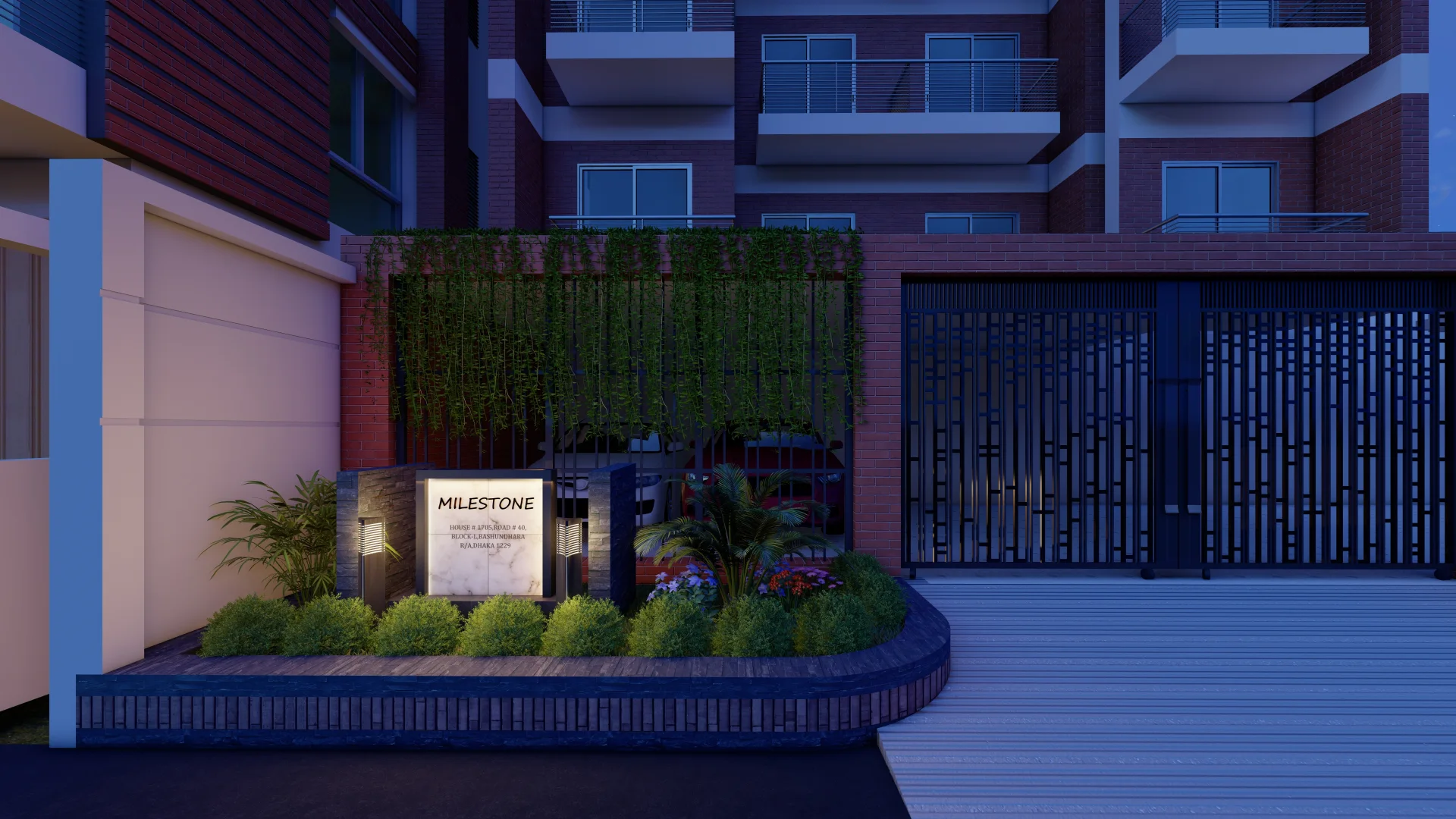 Night illumination view of Milestone entrance landscape with backlit marble monument sign and bollard lights in Bashundhara, Dhaka