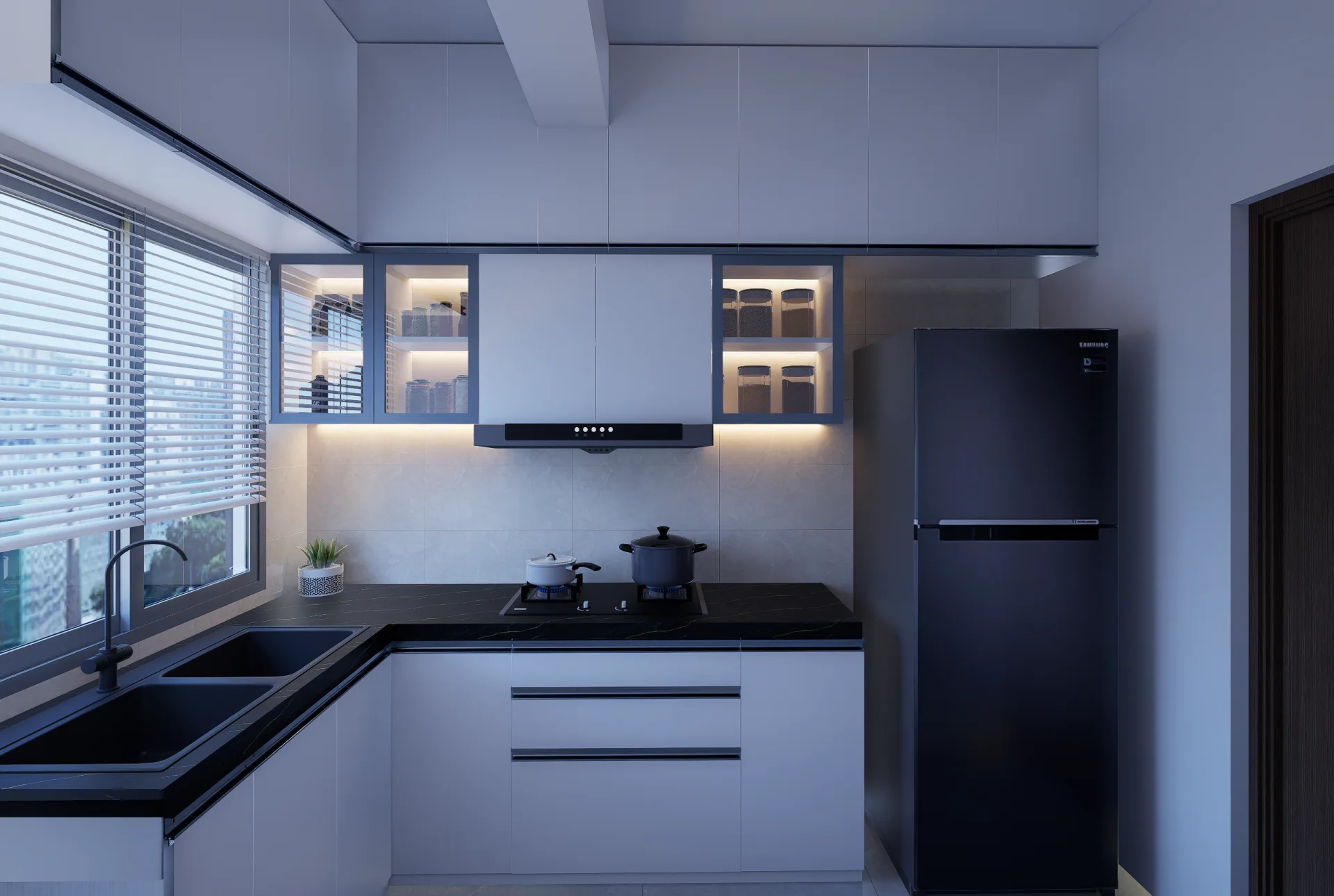 Contemporary modular kitchen with built-in gas hob ducted range hood and dedicated refrigerator alcove