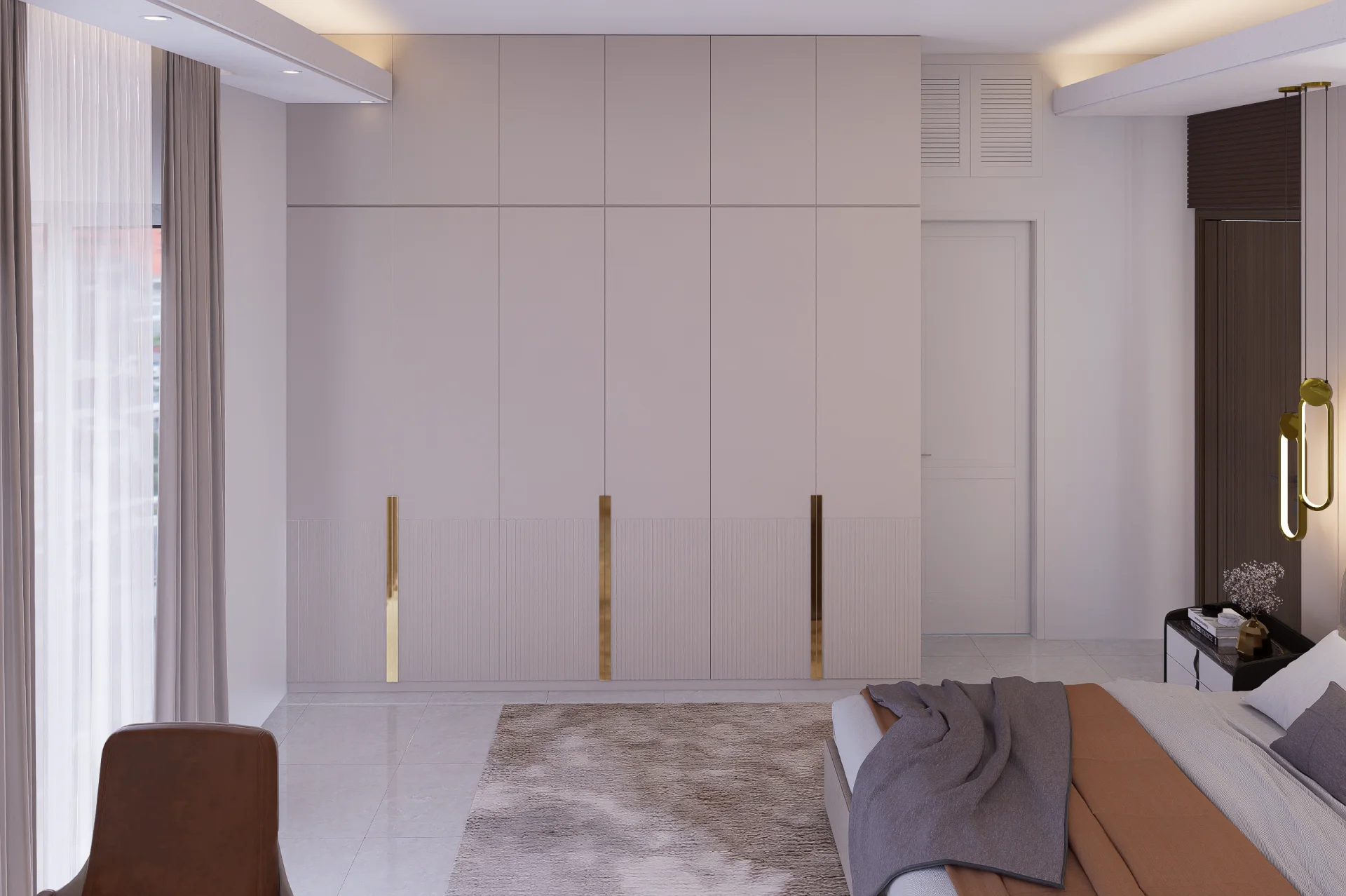 Junior bedroom built-in wardrobe wall with vertical fluting on lower half and polished brass vertical handles